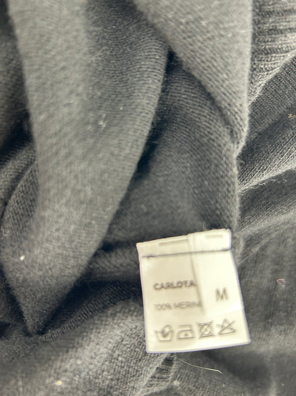 Pull noir à lacet jaune et bleu