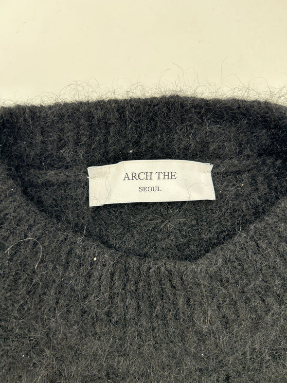Pull noir en laine