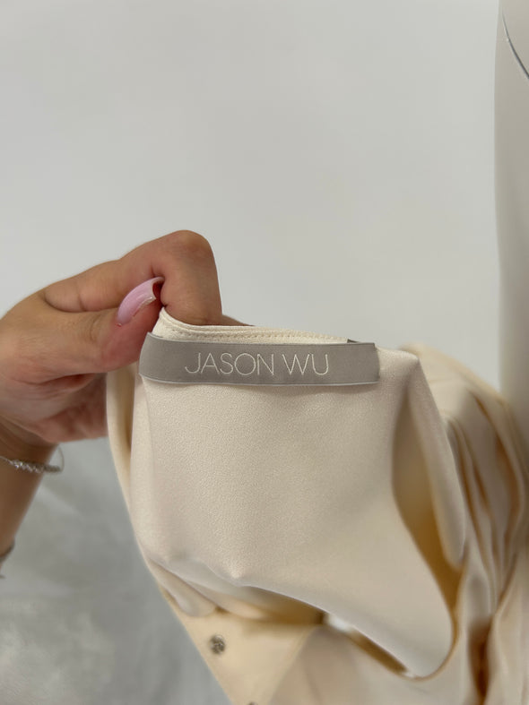 Top beige ceinturé sans manches