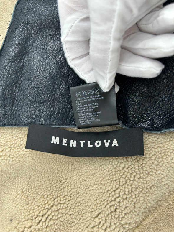 Manteau oversize en peau lainée