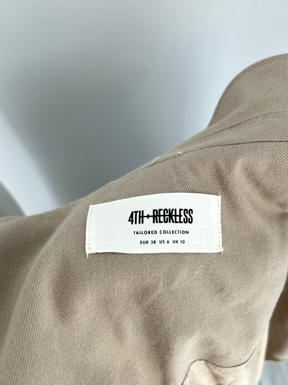 Trench-coat bi-matière