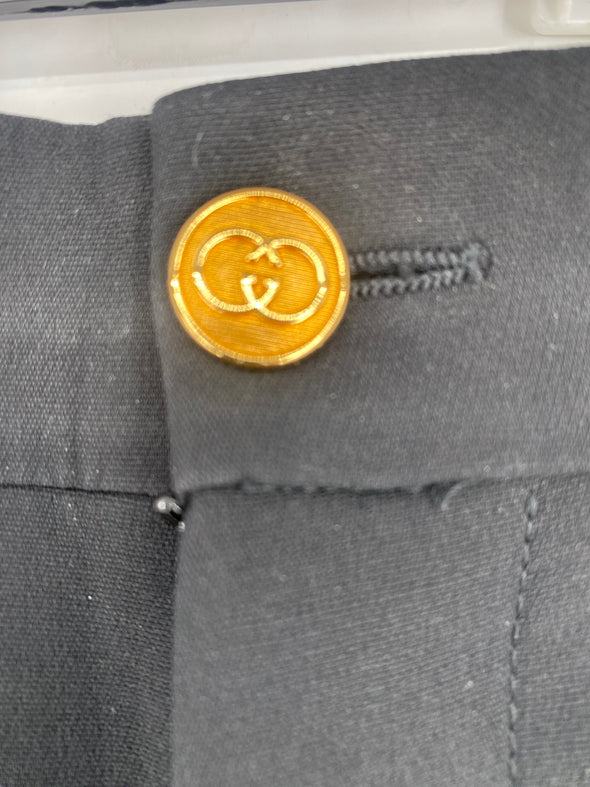 Pantalon bouton doré