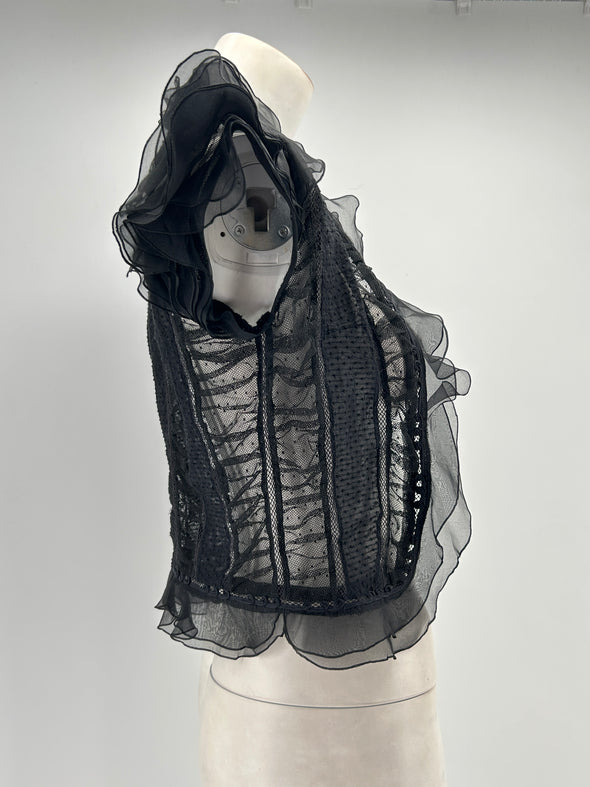 Blouse noire en coton transparente à volants