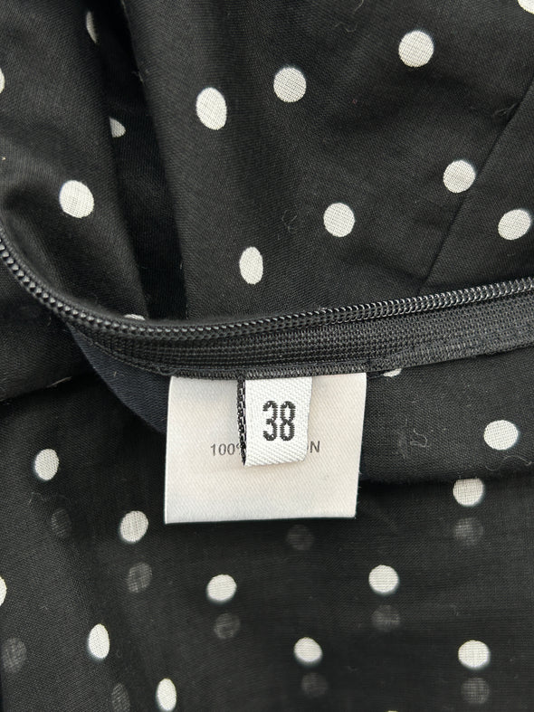 Robe noire à pois blancs