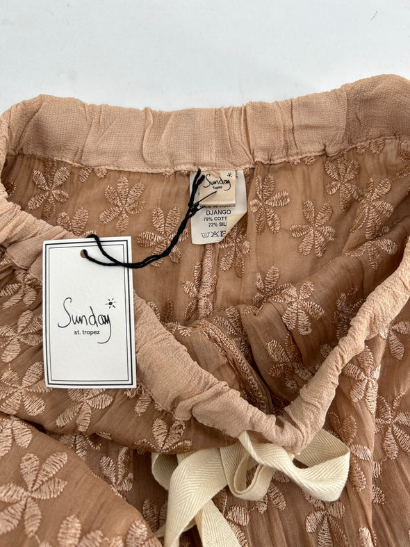 Pantalon fluide beige à imprimé floral