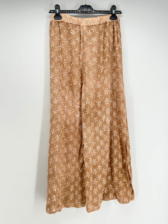 Pantalon fluide beige à imprimé floral