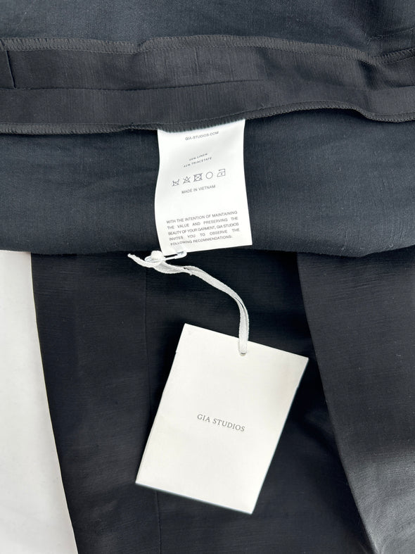 Pantalon de tailleur noir satiné
