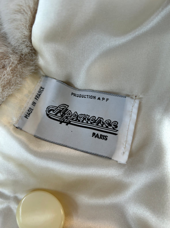 Manteau en fausse fourrure beige