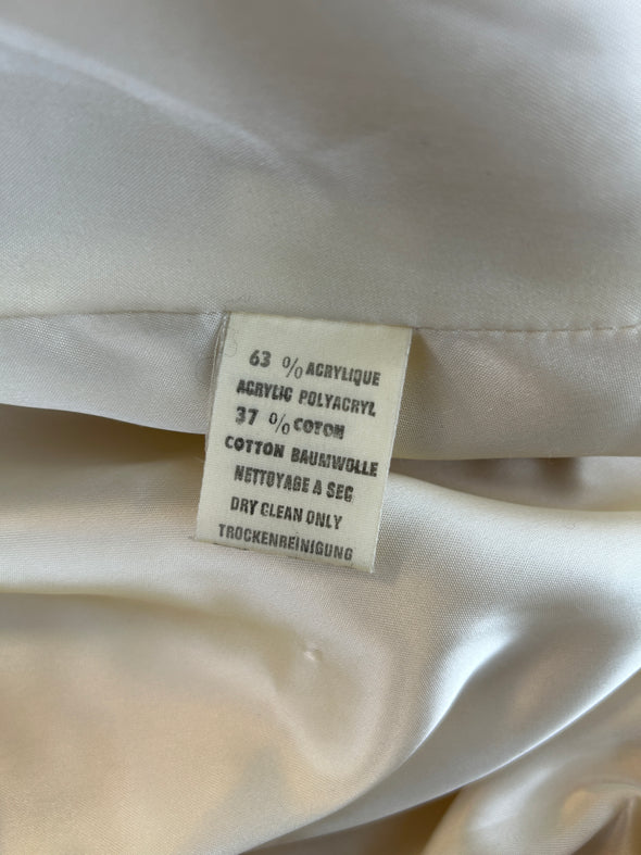 Manteau en fausse fourrure beige