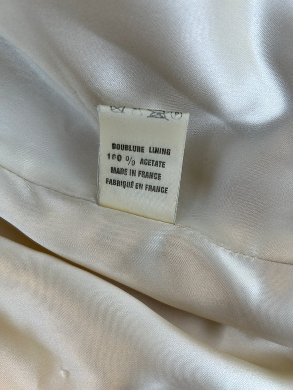 Manteau en fausse fourrure beige