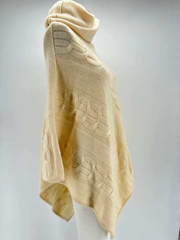 Poncho tressé crème