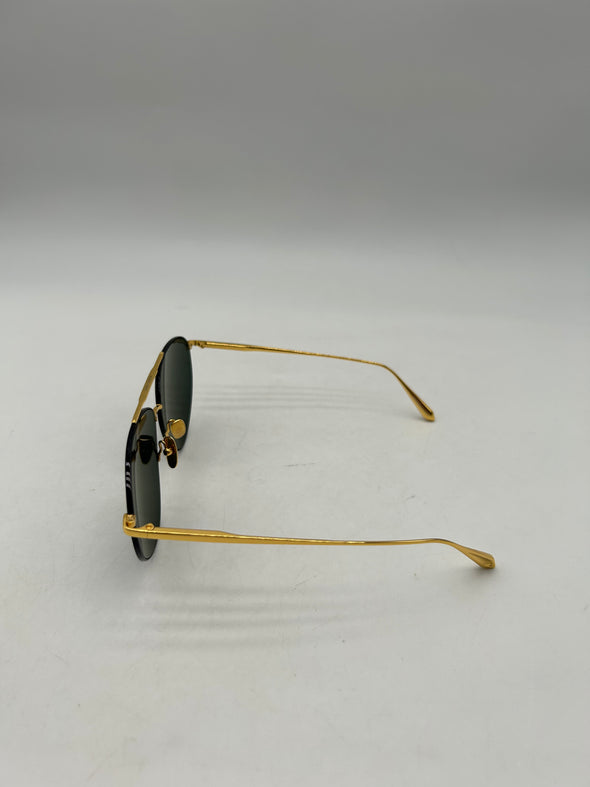 Lunettes de soleil noires et or