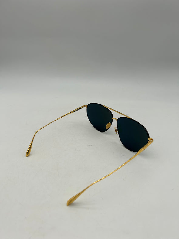 Lunettes de soleil noires et or