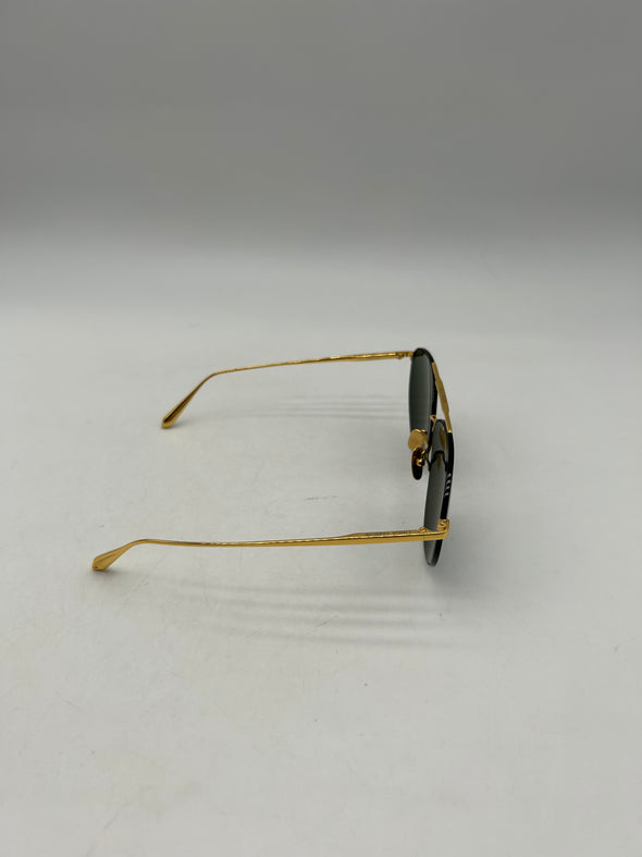 Lunettes de soleil noires et or