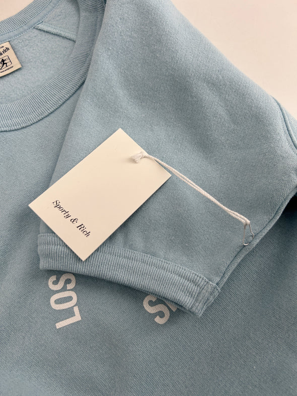 Pull bleu à manches courtes