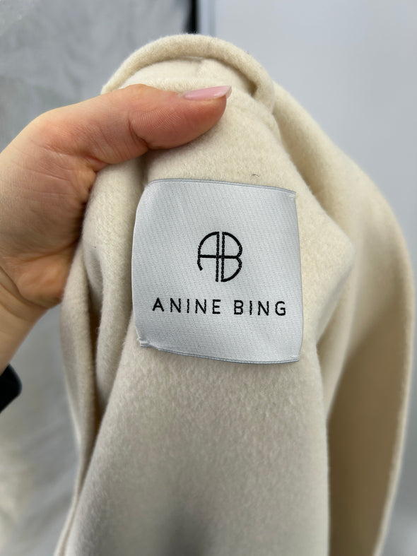 Manteau blanc cassé