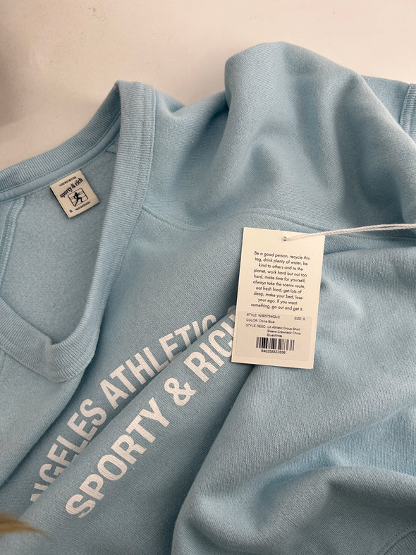 Pull bleu à manches courtes