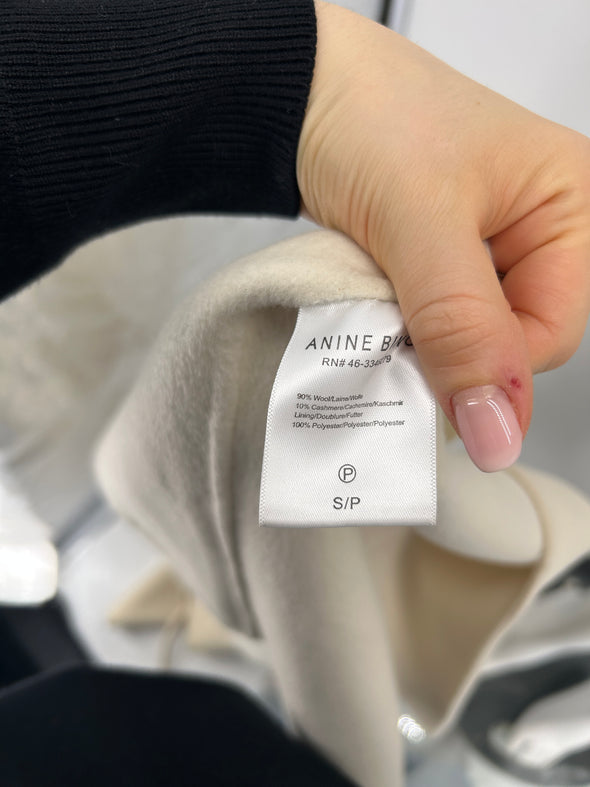 Manteau blanc cassé
