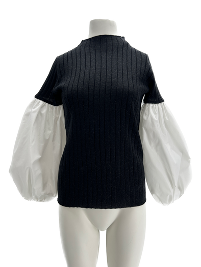 Top noir à manches bouffantes bi-matière