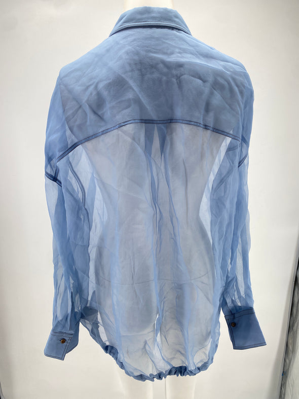 Chemise bleue transparente