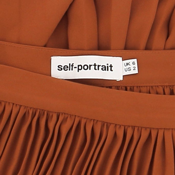 Jupe plissée terracotta