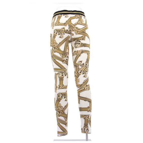 Legging blanc à motifs dorés