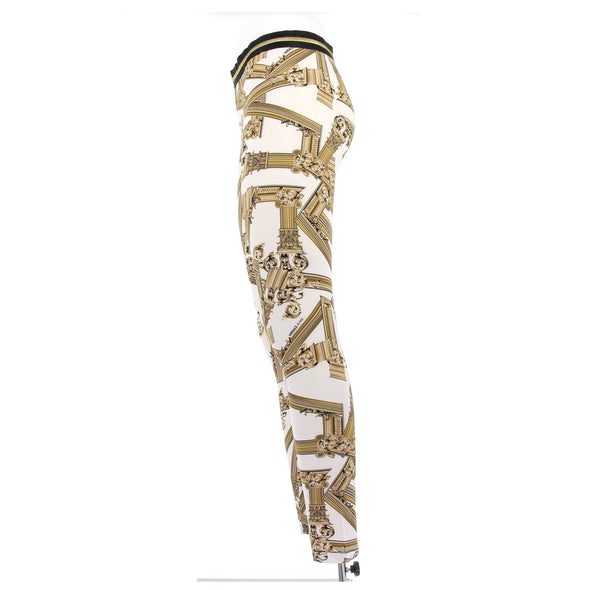 Legging blanc à motifs dorés