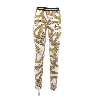 Legging blanc à motifs dorés