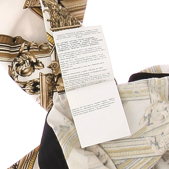 Legging blanc à motifs dorés