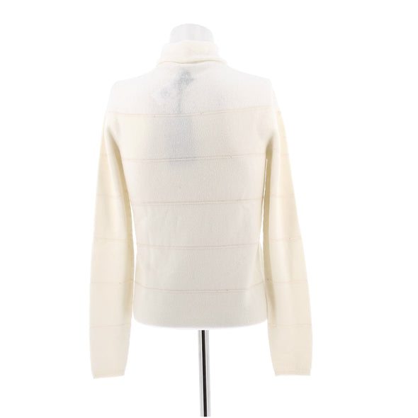 Pull col roulé en laine