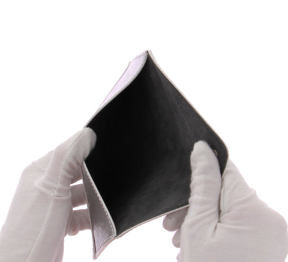 Pochette argentée en cuir épi