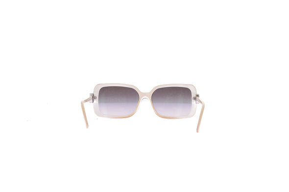 Lunettes de soleil noires et écrues