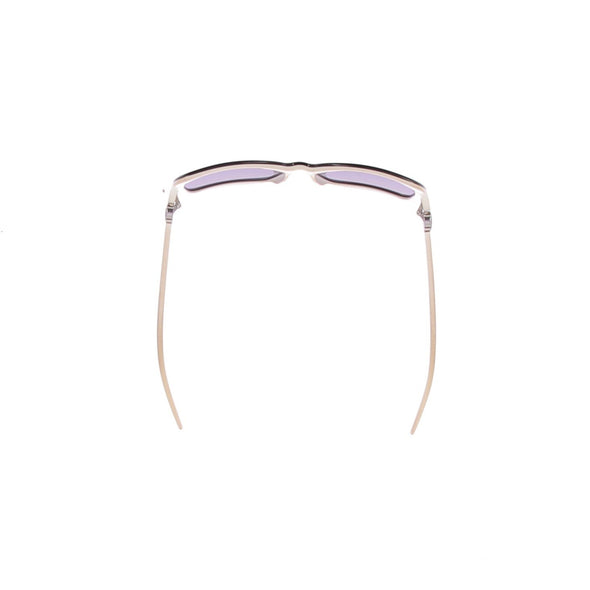 Lunettes de soleil noires et écrues