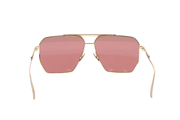 Lunette de soleil dorée