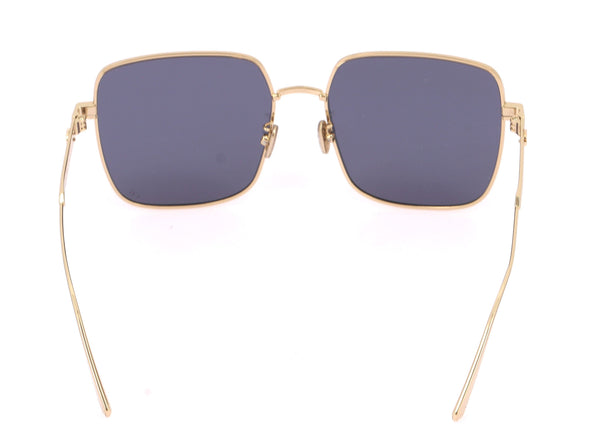 Lunettes de soleil dorées à verre bleu