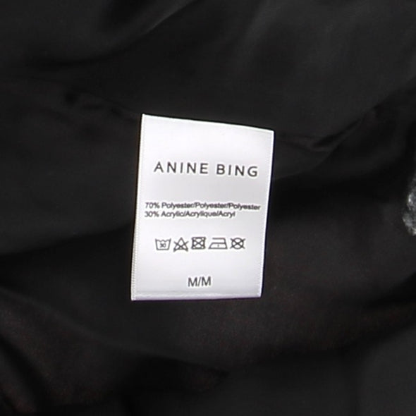 Manteau à carreaux