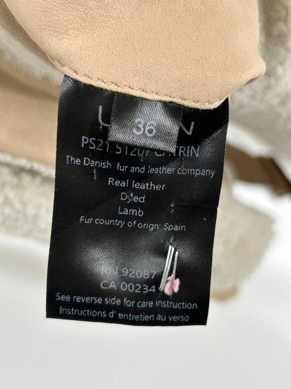 Trench-coat en cuir suédé et fourrure