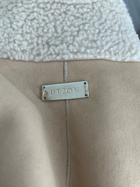 Trench-coat en cuir suédé et fourrure