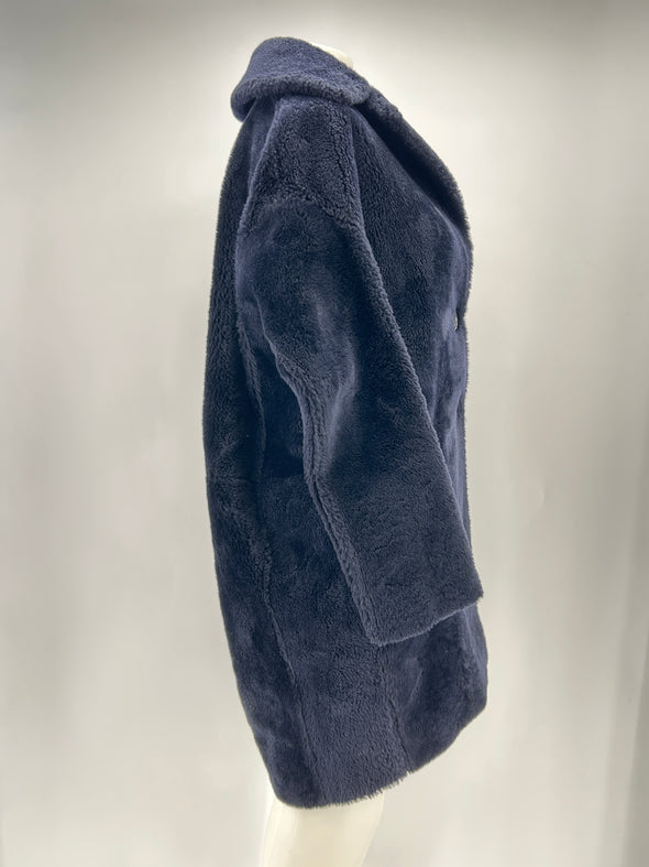 Manteau en peau lainée