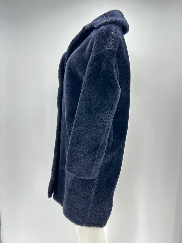 Manteau en peau lainée