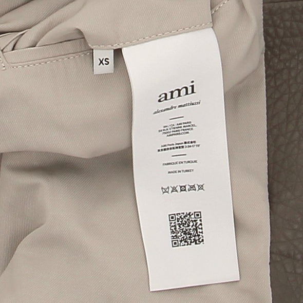 Manteau taupe en cuir