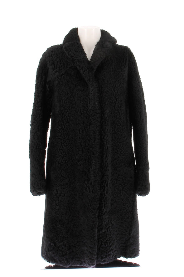 Manteau en shearling noir