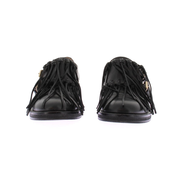 Mocassins en cuir noirs avec franges