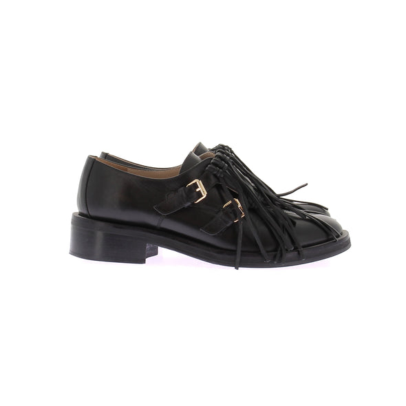 Mocassins en cuir noirs avec franges
