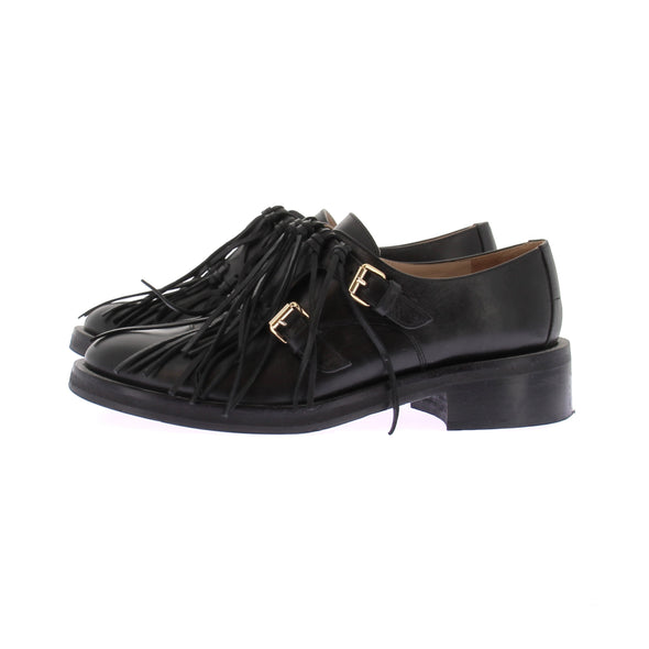 Mocassins en cuir noirs avec franges