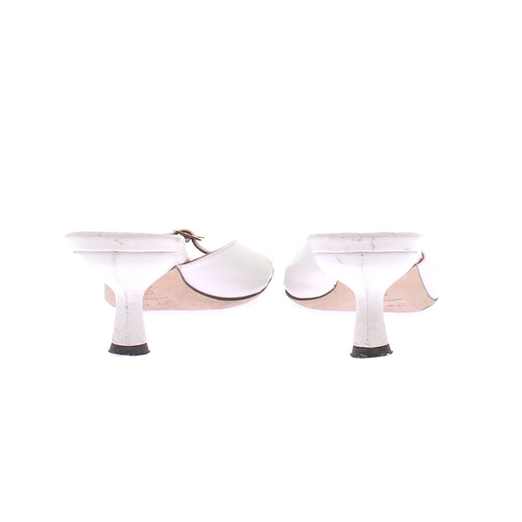 Mules blanches à talons en cuir