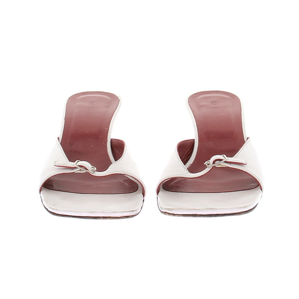Mules blanches à talons en cuir