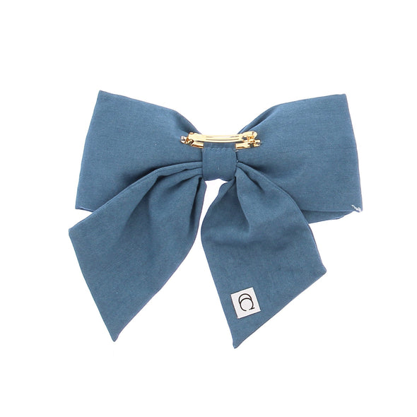 Noeud pour cheveux en tissu bleu
