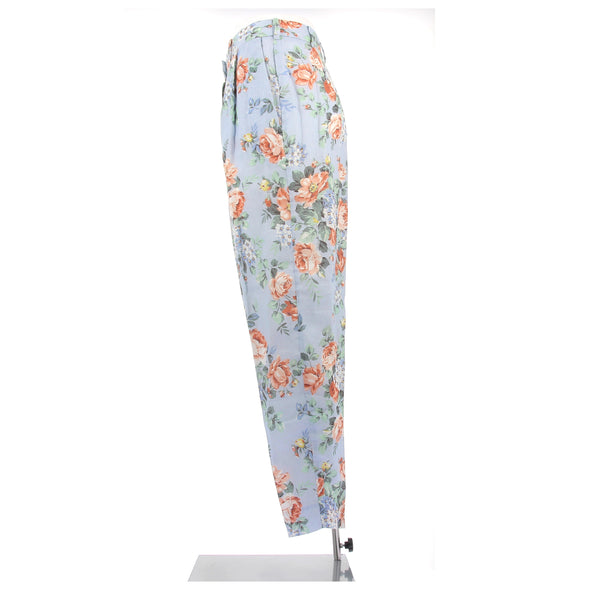 Pantalon bleu fluide à motif fleuri