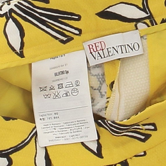 Pantalon jaune imprimé